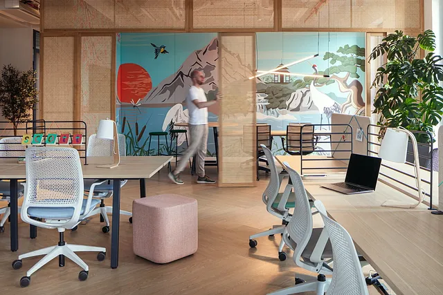 Open coworking area with shared desks and natural light